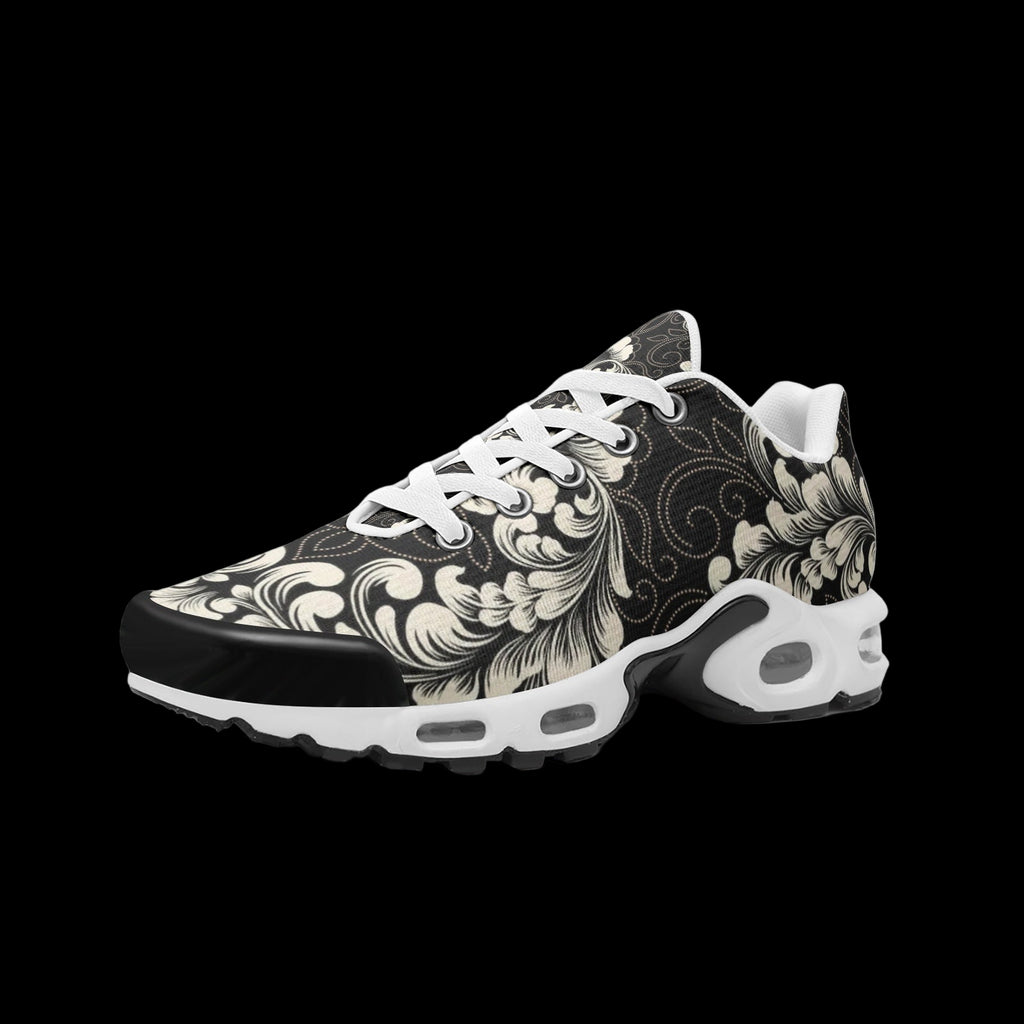 Black and white sneaker with floral pattern on a white background